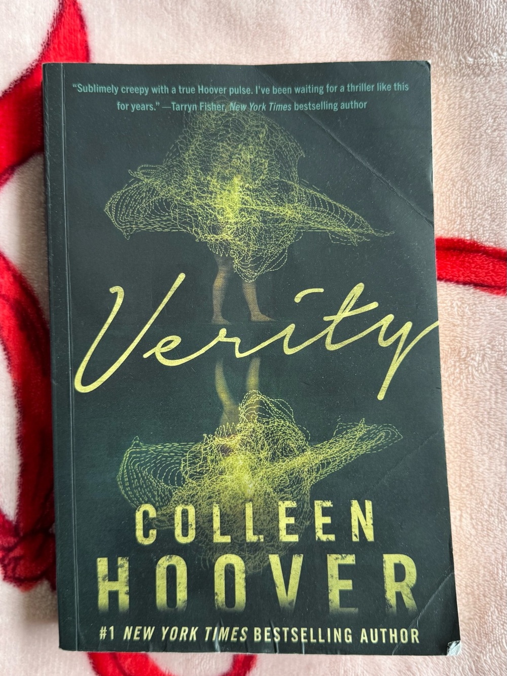 Verity by — Black and Yellow Paperback Novel